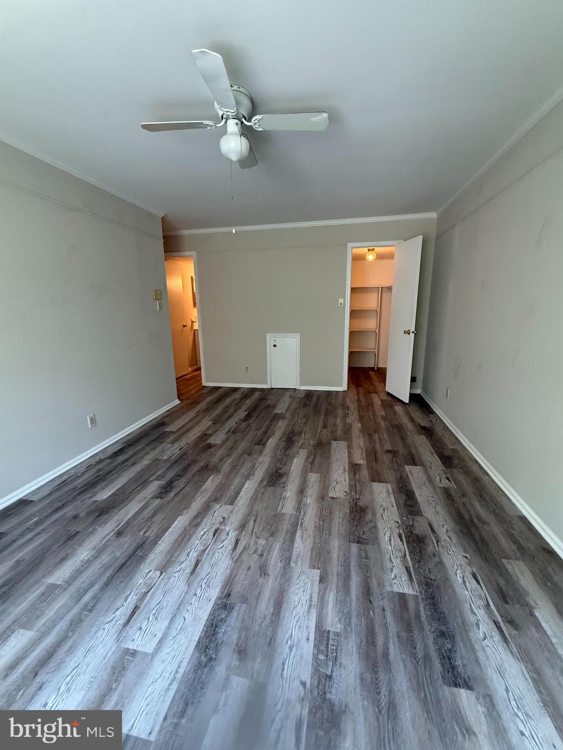 5702B Adelaide Drive Mount Laurel, NJ 08054 - Photo 12 of 22 wooden floor in an empty room with a window