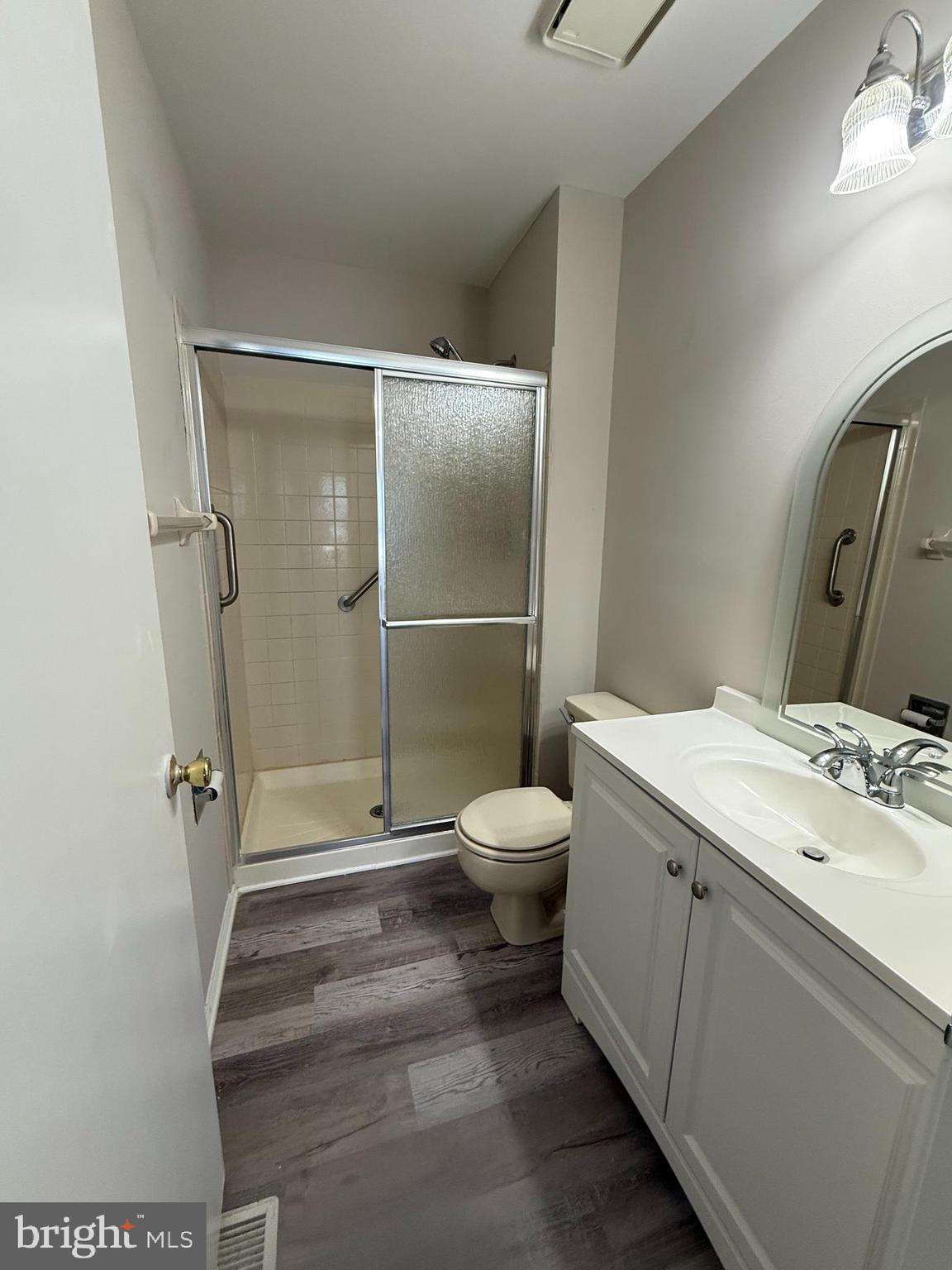 5702B Adelaide Drive Mount Laurel, NJ 08054 - Photo 13 of 22 a bathroom with a granite countertop sink toilet and shower