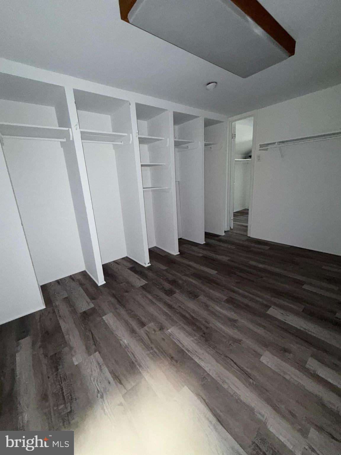 5702B Adelaide Drive Mount Laurel, NJ 08054 - Photo 15 of 22 a view of empty room with wooden floor