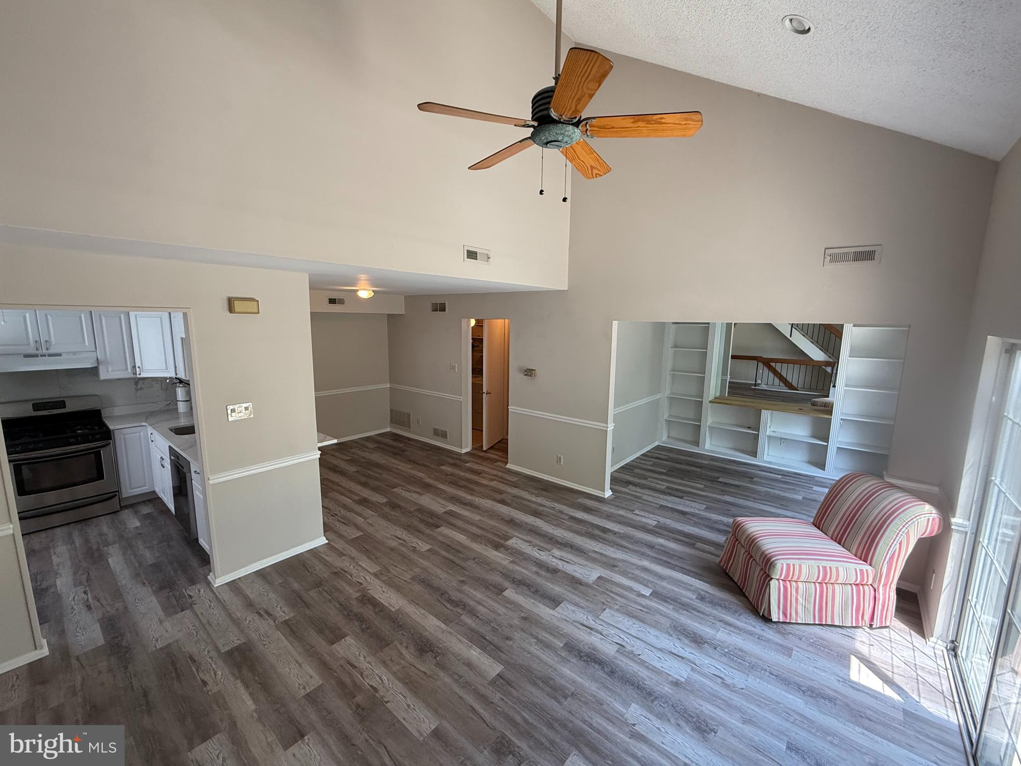 5702B Adelaide Drive Mount Laurel, NJ 08054 - Photo 9 of 22 a living room with furniture and a wooden floor