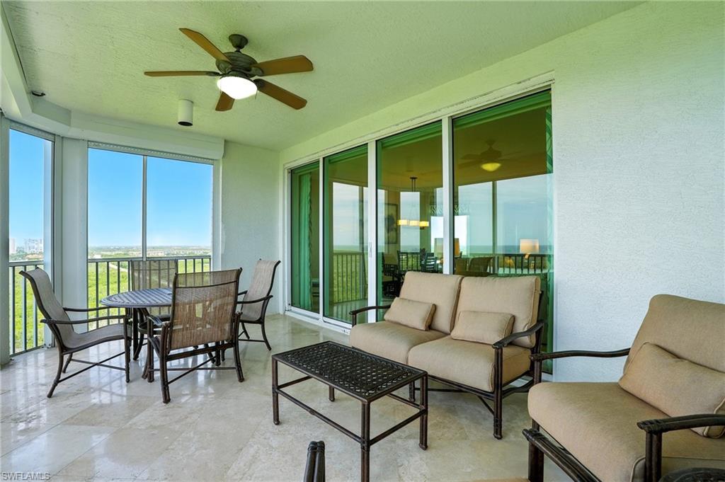 265 Indies Way, Unit 1605 Naples, FL 34110 - Photo 34 of 49 a living room with furniture