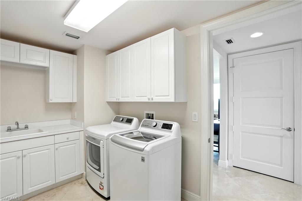 265 Indies Way, Unit 1605 Naples, FL 34110 - Photo 35 of 49 a view of utility room with washer and dryer
