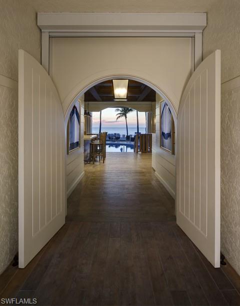 265 Indies Way, Unit 1605 Naples, FL 34110 - Photo 47 of 49 a view of livingroom with hardwood floor and furniture