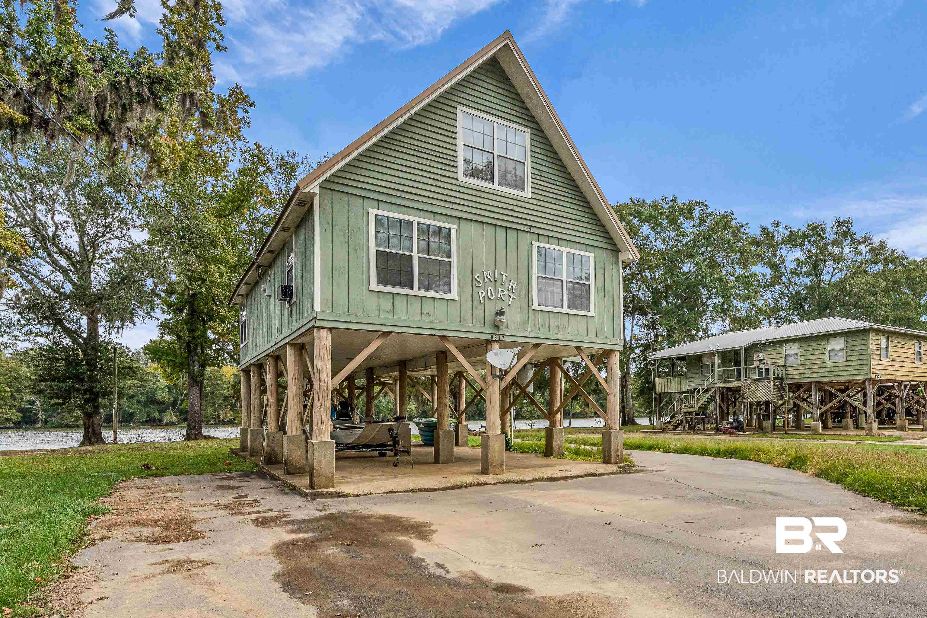 8317 Bryant's Lndg Road Stockton, AL 36579 - Photo 2 of 28 View of property's community with a carport and concrete driveway