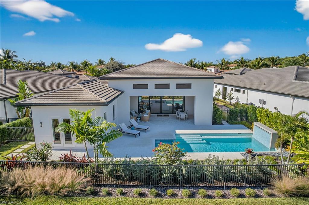 16732 Lucarno Way Naples, FL 34110 - Photo 38 of 50 Aerial Rear Exterior