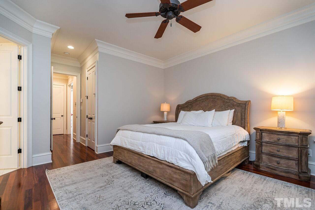 1715 Nottingham Road Raleigh, NC 27607 - Photo 17 of 35 a bedroom with a bed and cabinet