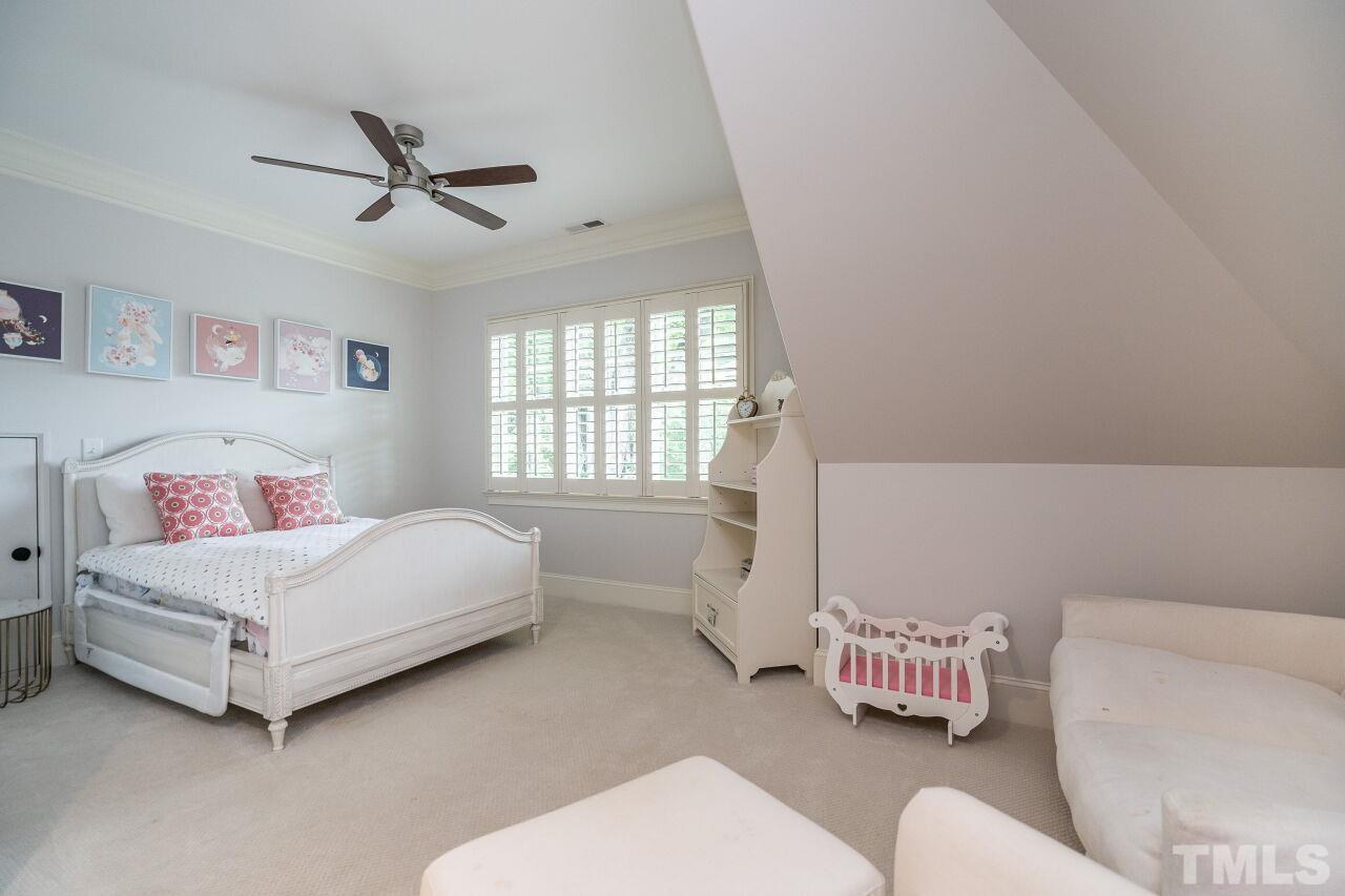 1715 Nottingham Road Raleigh, NC 27607 - Photo 21 of 35 a bedroom with a bed and a couch