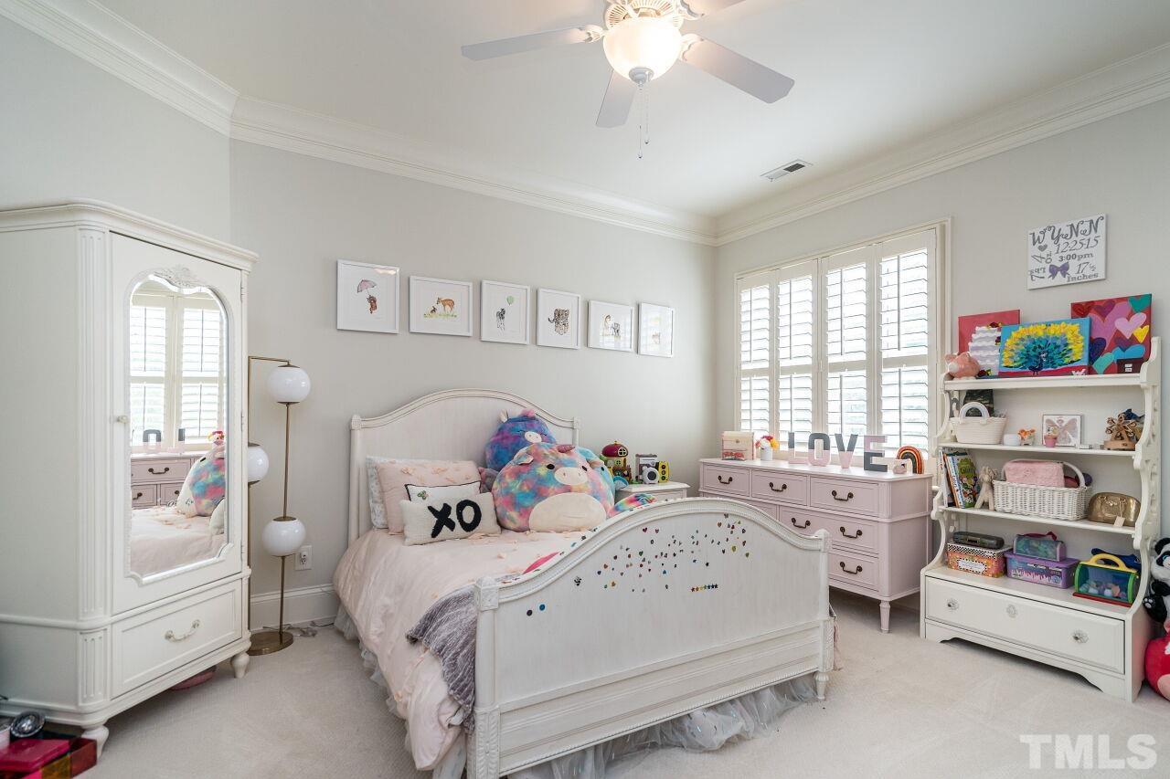 1715 Nottingham Road Raleigh, NC 27607 - Photo 23 of 35 a bedroom with a bed and a window