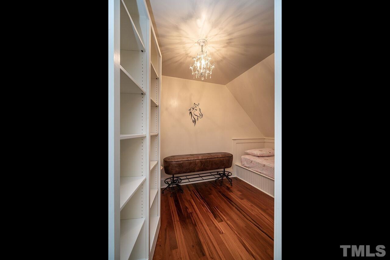 1715 Nottingham Road Raleigh, NC 27607 - Photo 26 of 35 a view of a hallway with wooden floor