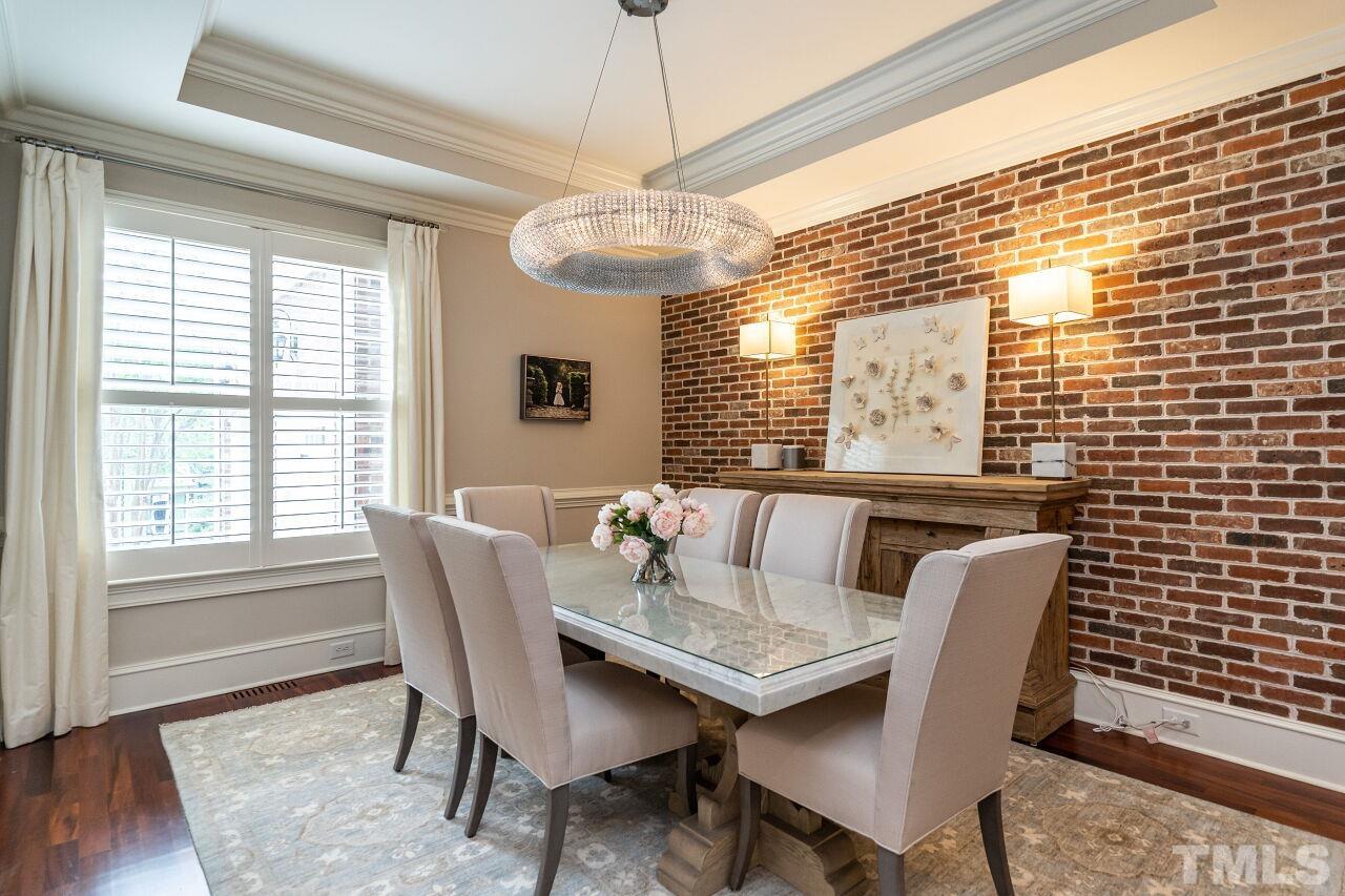1715 Nottingham Road Raleigh, NC 27607 - Photo 3 of 35 a view of a dining room with furniture window and wooden floor