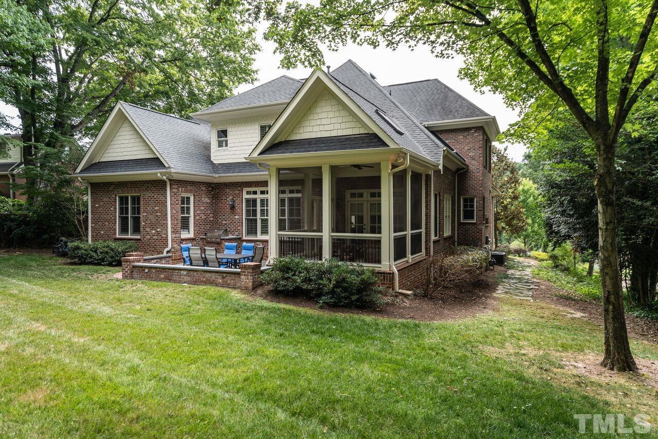 1715 Nottingham Road Raleigh, NC 27607 - Photo 35 of 35 a view of a house with a yard and sitting area