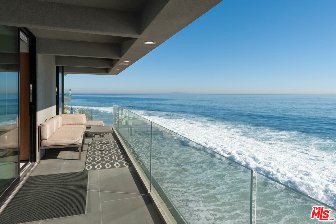 24450 Malibu Road Malibu, CA 90265 - Photo 18 of 34 a view of ocean from a balcony