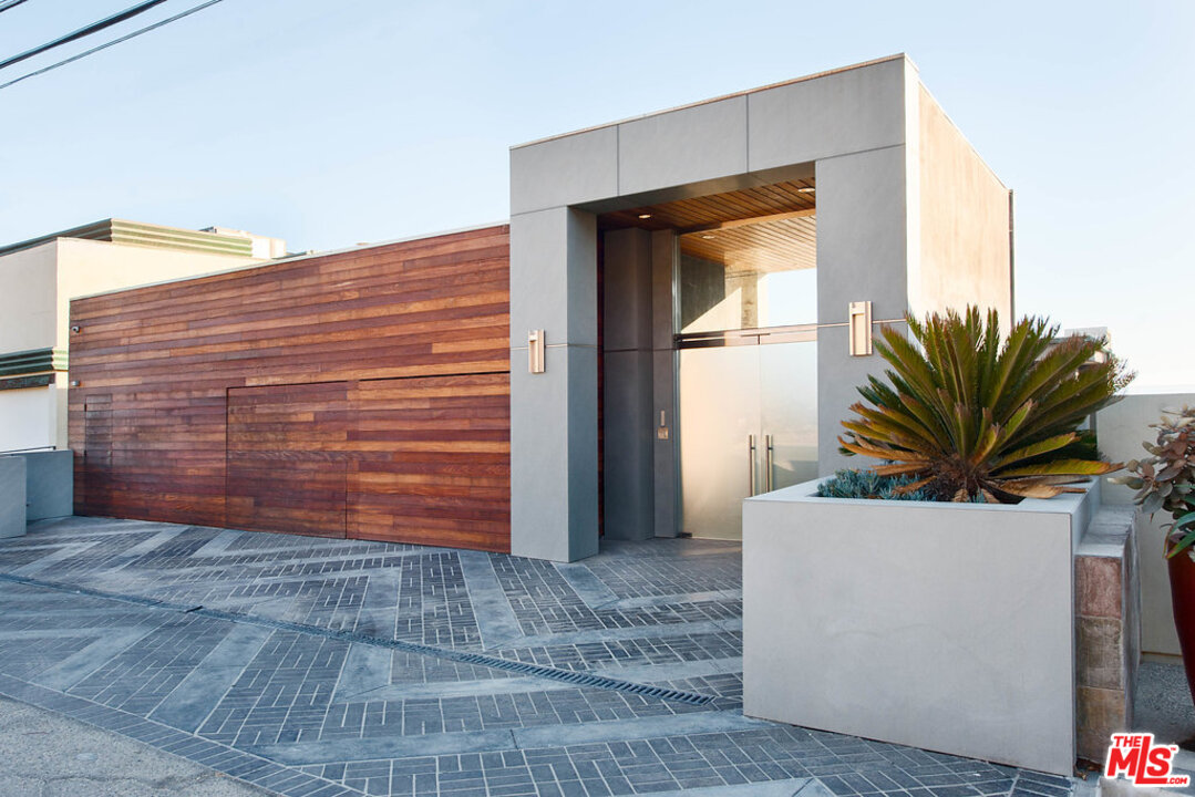24450 Malibu Road Malibu, CA 90265 - Photo 3 of 34 a view of front door and yard