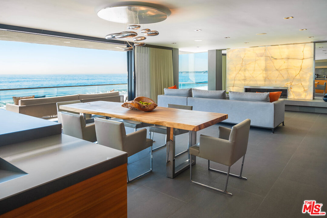 24450 Malibu Road Malibu, CA 90265 - Photo 8 of 34 a view of a dining room with furniture and window