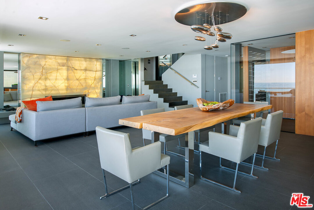 24450 Malibu Road Malibu, CA 90265 - Photo 9 of 34 a view of a dining room with furniture window and outside view