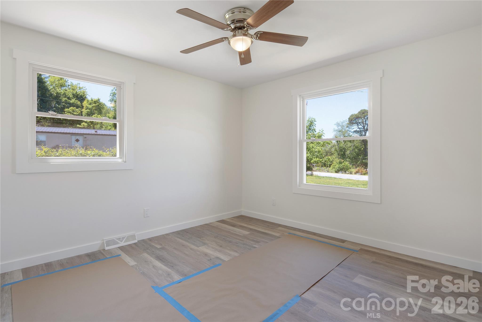 287 Duncan Road Flat Rock, NC 28731 - Photo 8 of 13 a view of an empty room with a window