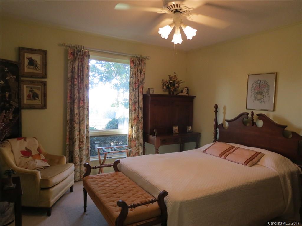 2440 West End Road Chester, SC 29706 - Photo 8 of 24 a bedroom with a bed and a flat screen tv