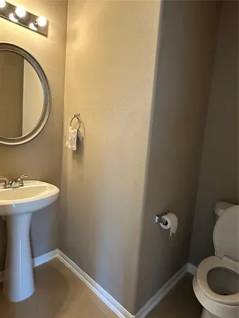 a bathroom with a sink and a toilet