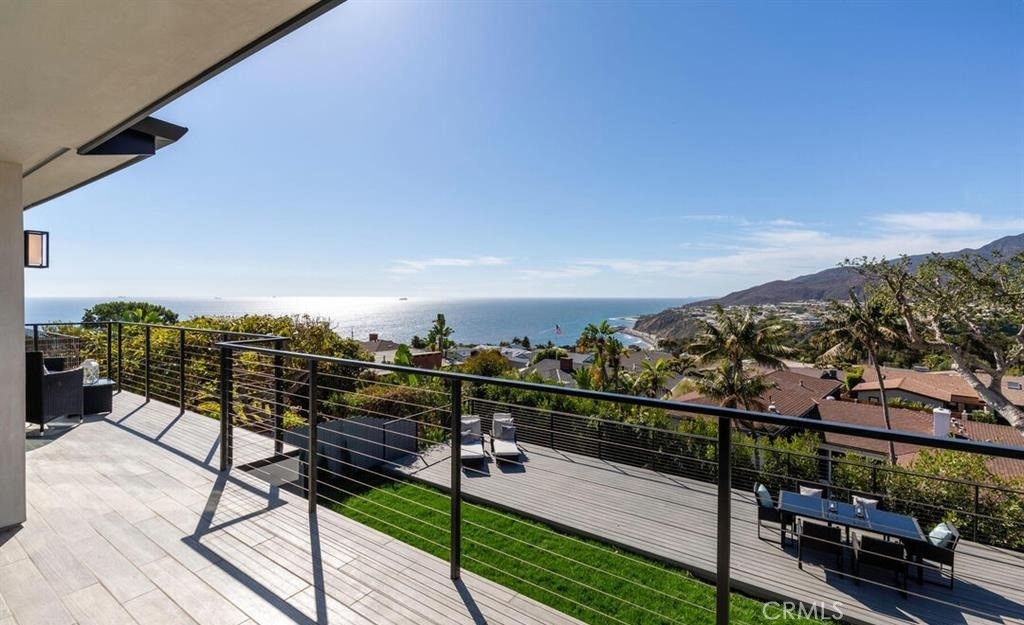 243 Notteargenta Road Pacific Palisades, CA 90272 - Photo 2 of 56 a view of a terrace with chairs