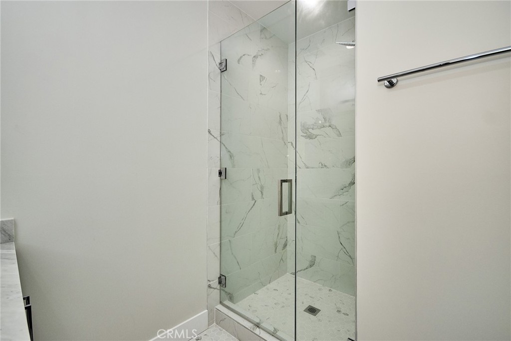 243 Notteargenta Road Pacific Palisades, CA 90272 - Photo 52 of 56 a bathroom with a shower