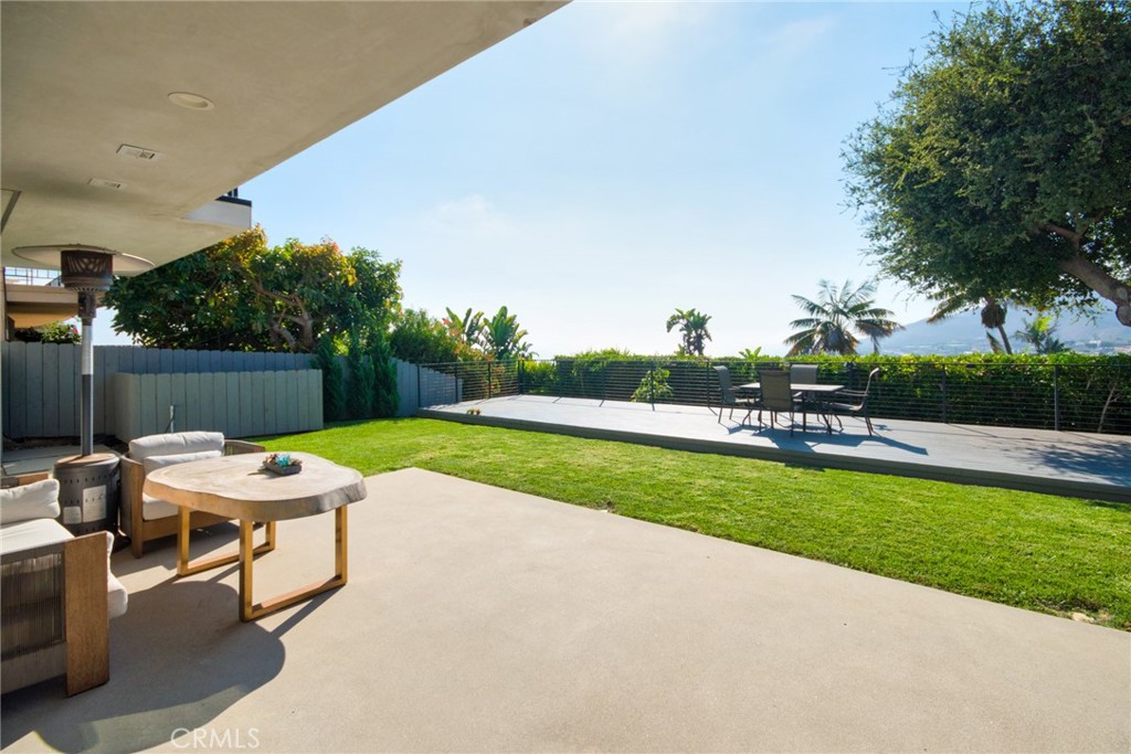 243 Notteargenta Road Pacific Palisades, CA 90272 - Photo 54 of 56 a view of a patio with swimming pool