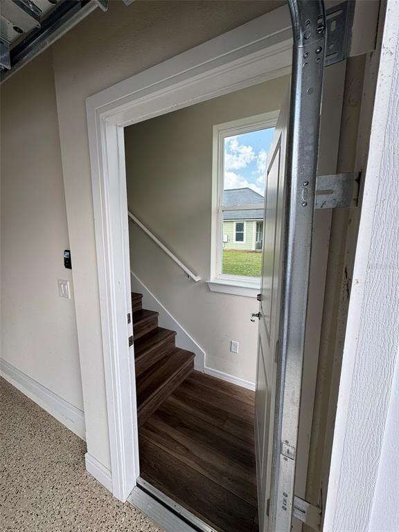 6350 Rover Way St. Cloud, FL 34771 - Photo 2 of 14 a view of entryway and hall with wooden floor
