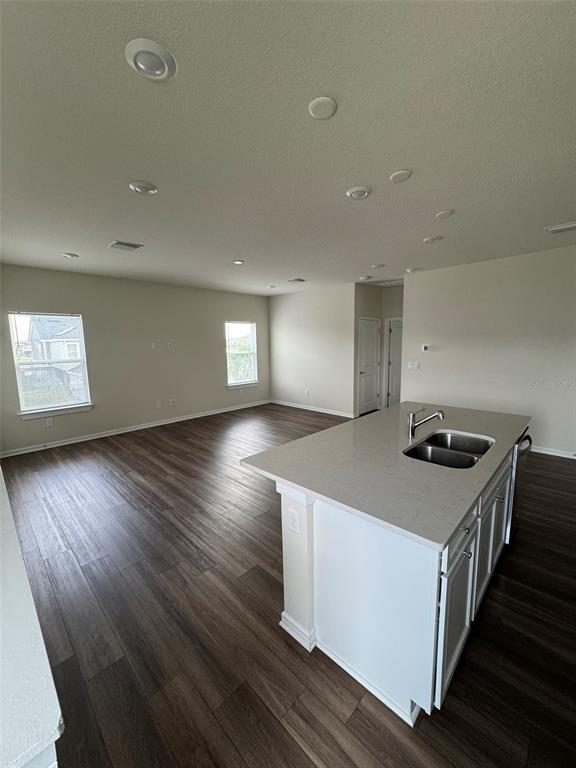 6350 Rover Way St. Cloud, FL 34771 - Photo 6 of 14 a kitchen that has a sink and a stove