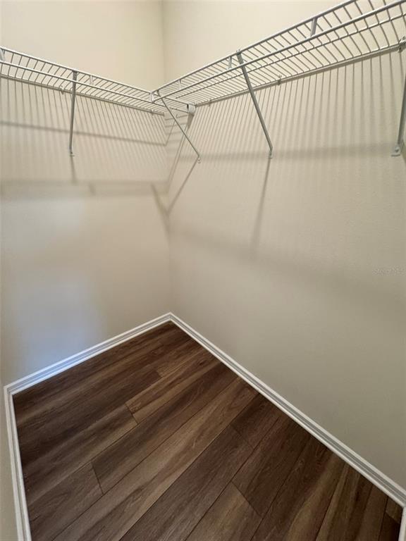 6350 Rover Way St. Cloud, FL 34771 - Photo 10 of 14 a view of a room with racks on the wall