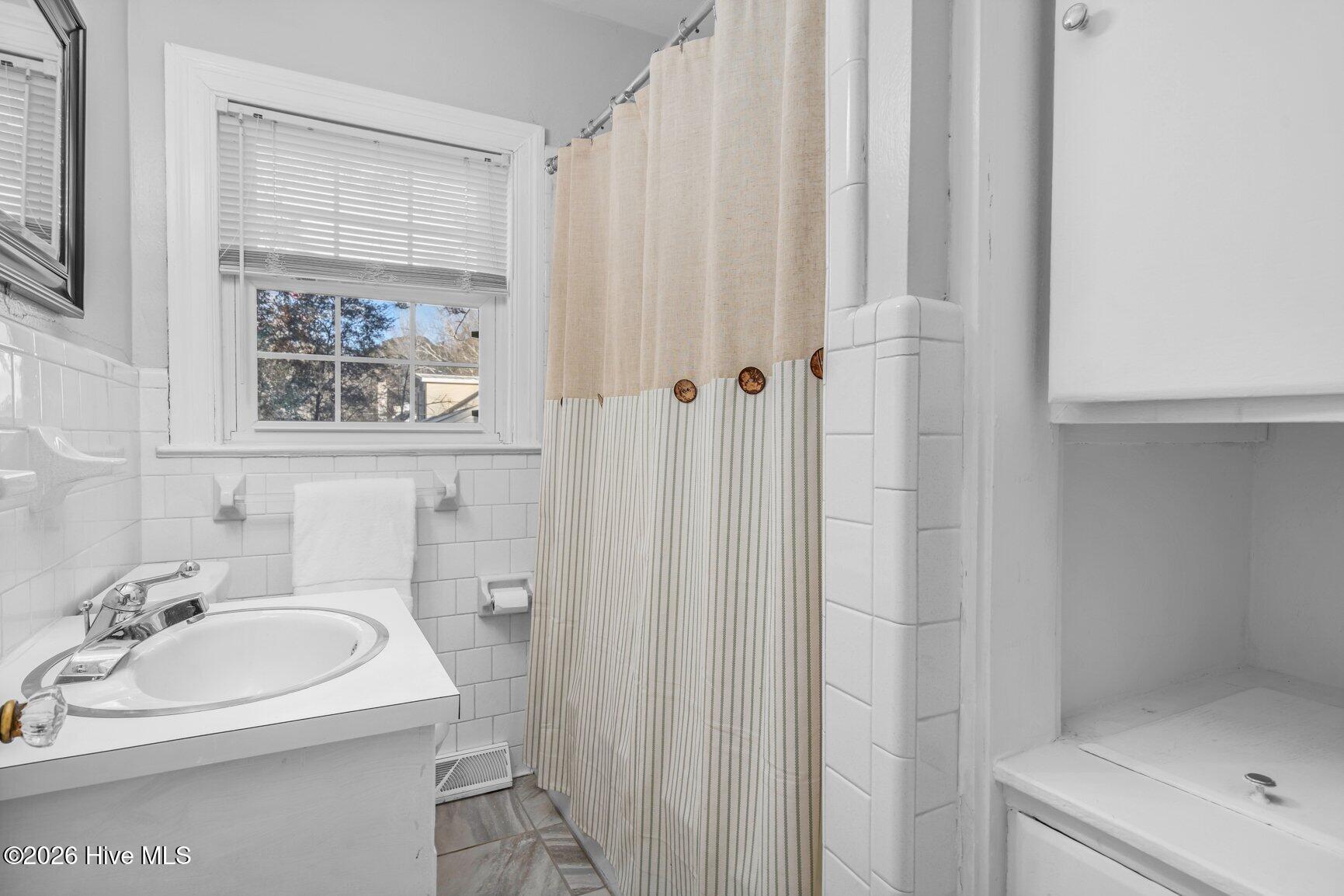 208 Clyde Avenue Northwest Wilson, NC 27893 - Photo 14 of 32 Downstairs Bathroom