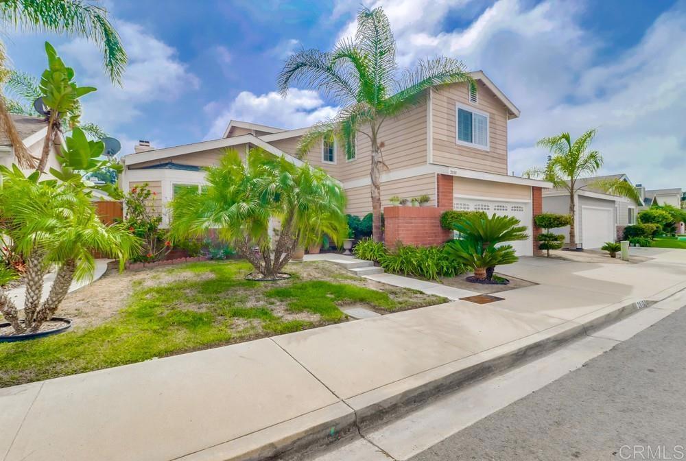 2010 Bridgeport Chula Vista, CA 91913 - Photo 2 of 43 a front view of a house with a garden and a yard