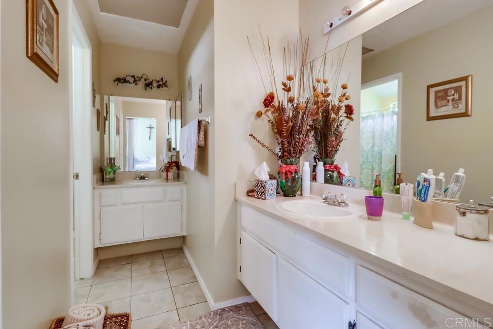 2010 Bridgeport Chula Vista, CA 91913 - Photo 24 of 43 a bathroom with sink and mirror