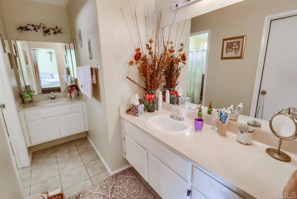 2010 Bridgeport Chula Vista, CA 91913 - Photo 25 of 43 a bathroom with a sink and a mirror