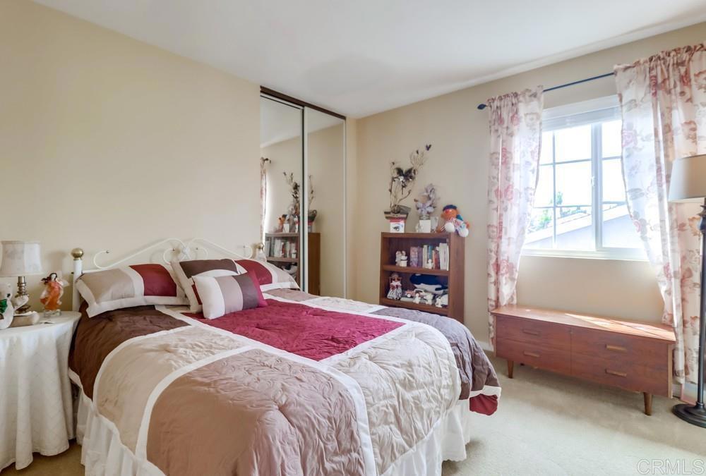 2010 Bridgeport Chula Vista, CA 91913 - Photo 28 of 43 a bedroom with a bed and a window