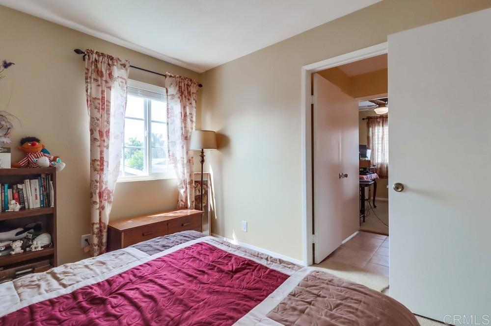 2010 Bridgeport Chula Vista, CA 91913 - Photo 29 of 43 a bedroom with a bed and a window