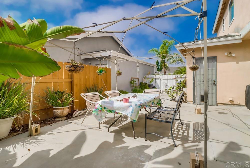 2010 Bridgeport Chula Vista, CA 91913 - Photo 35 of 43 a view of a patio with table and chairs potted plants