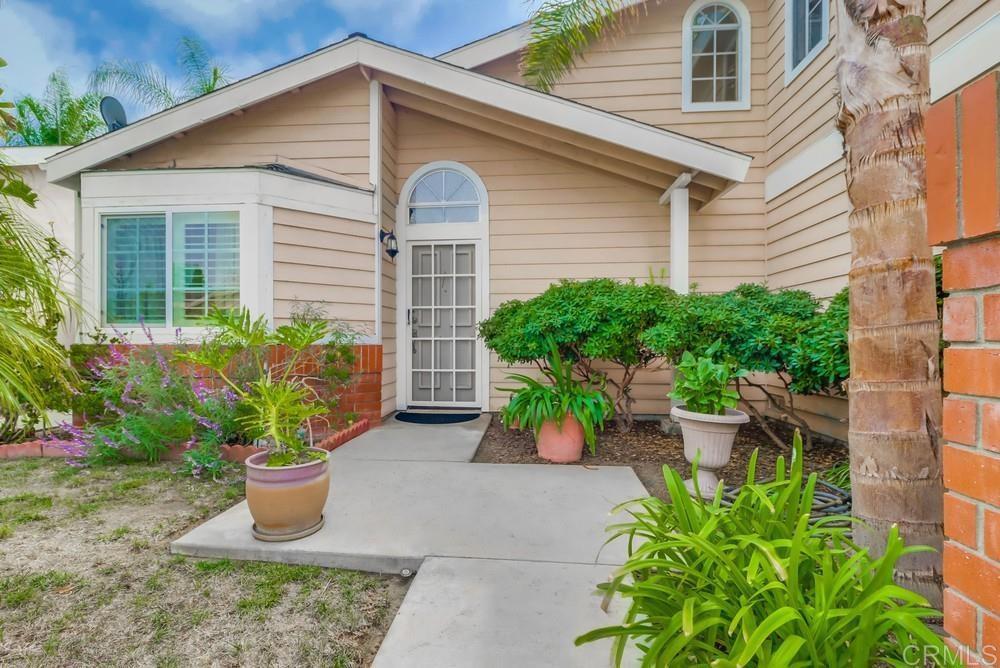 2010 Bridgeport Chula Vista, CA 91913 - Photo 5 of 43 a view of a house with potted plants and a bench
