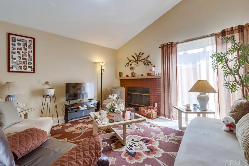 2010 Bridgeport Chula Vista, CA 91913 - Photo 6 of 43 a living room with furniture and a fireplace