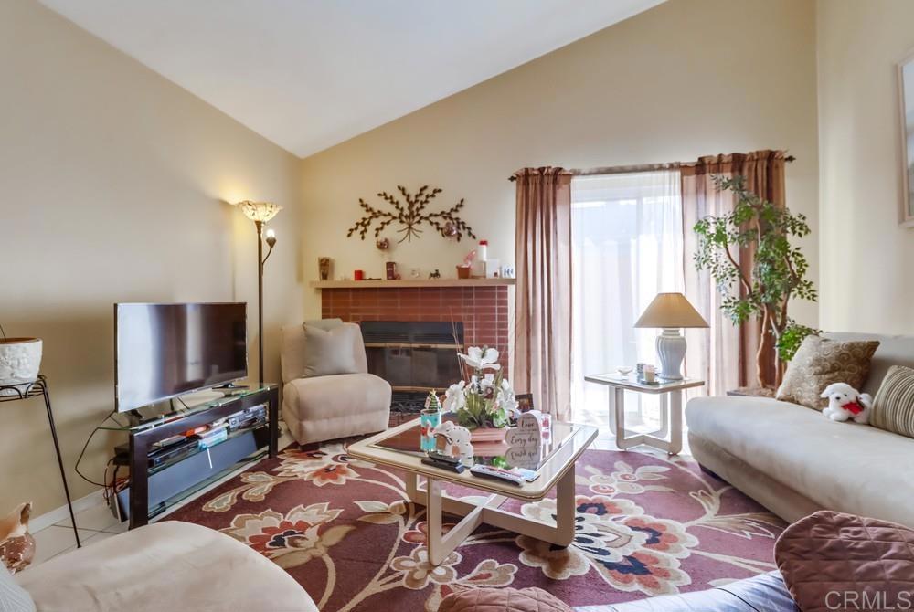 2010 Bridgeport Chula Vista, CA 91913 - Photo 7 of 43 a living room with furniture and a fireplace