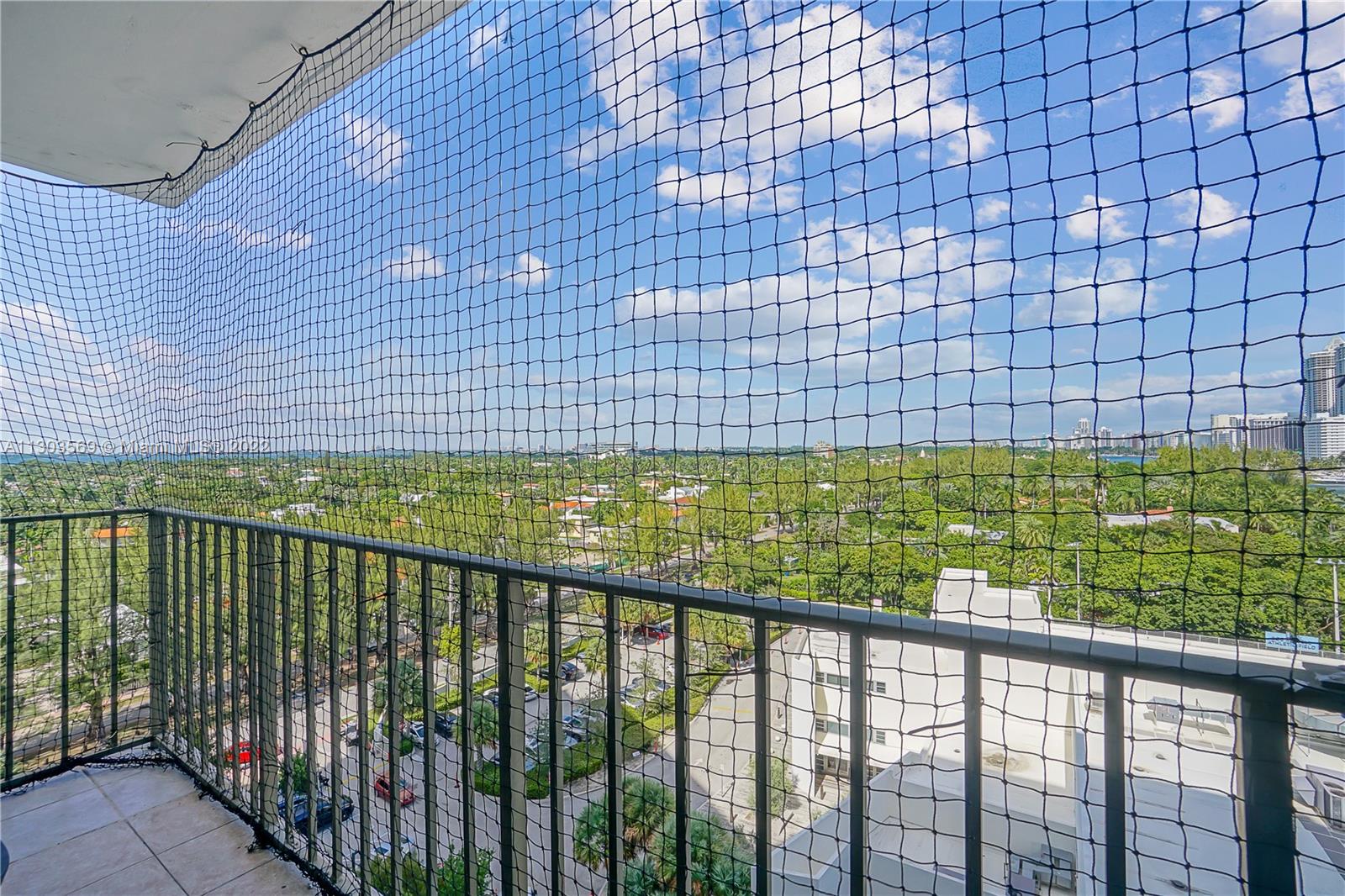4101 Pine Tree Drive, Unit 908 Miami Beach, FL 33140 - Photo 14 of 41 a view of a balcony