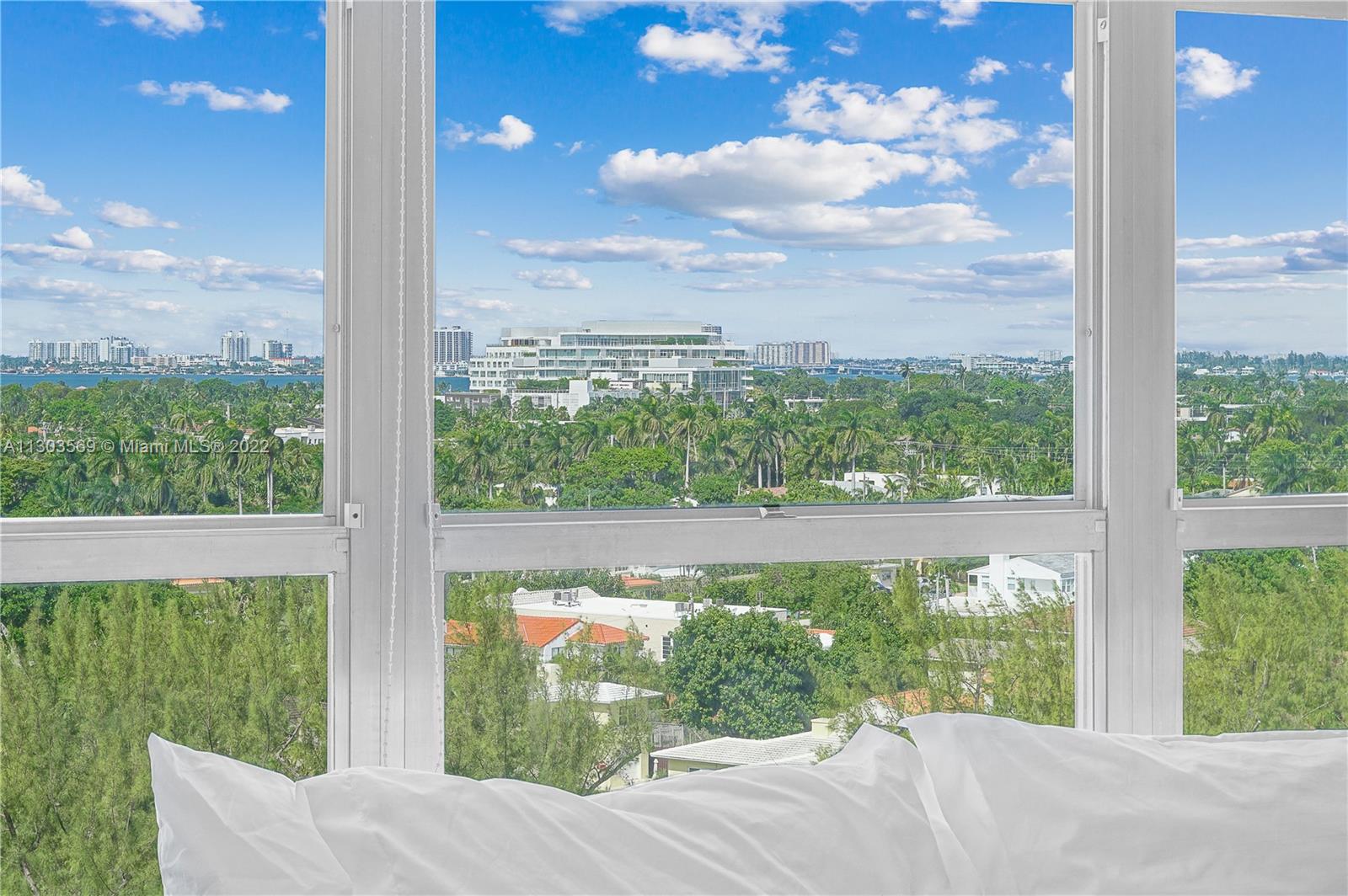 4101 Pine Tree Drive, Unit 908 Miami Beach, FL 33140 - Photo 27 of 41 a view of a garden from a window