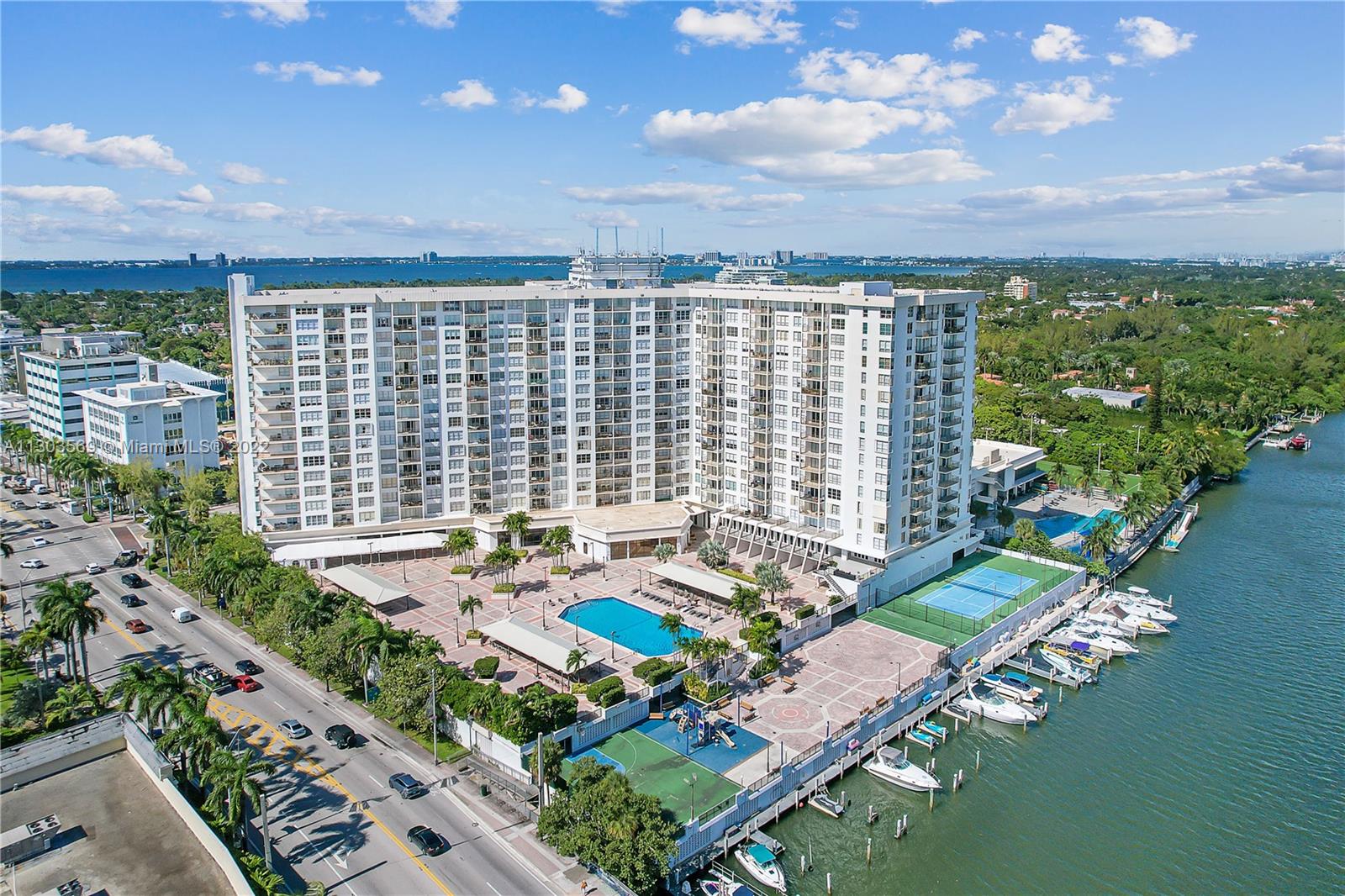 4101 Pine Tree Drive, Unit 908 Miami Beach, FL 33140 - Photo 40 of 41 a view of a patio with furniture