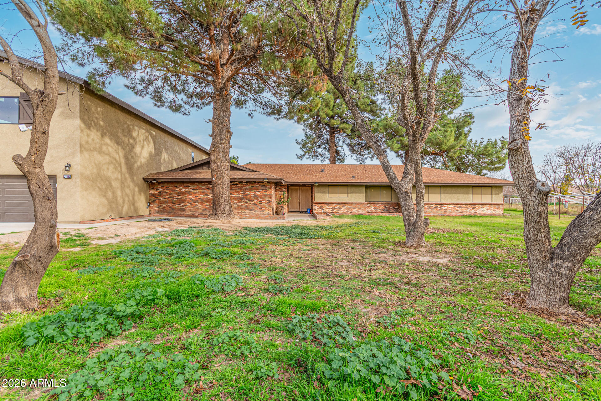 21613 South 154th Street Gilbert, AZ 85298 - Photo 1 of 57 a view of a house with yard and tree s