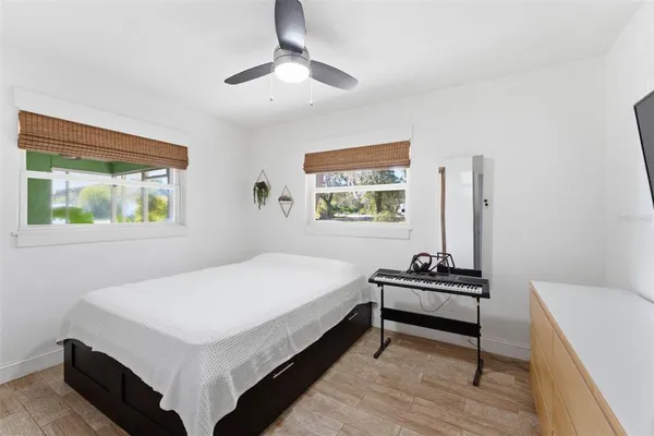 a bathroom with a double vanity sink mirror and toilet