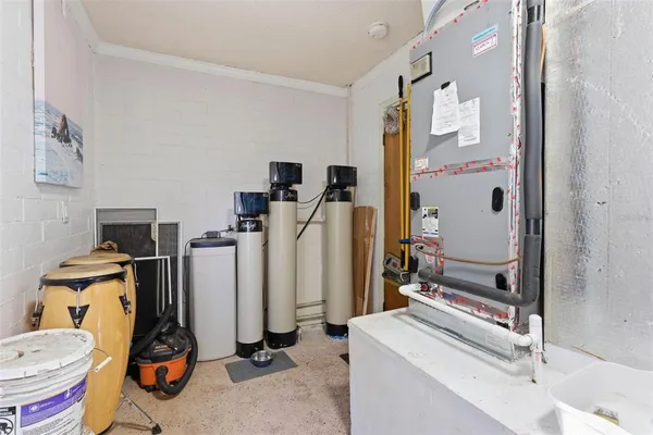 a view of a balcony with wooden floor and fence