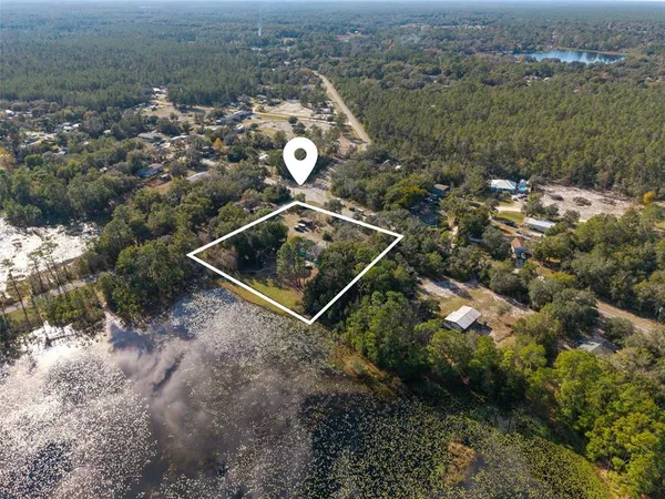 $390,000 | 26310 Fishermans Road, Paisley, FL 32767
