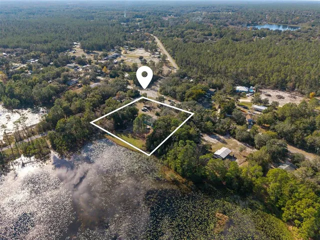 $390,000 | 26310 Fishermans Road, Paisley, FL 32767