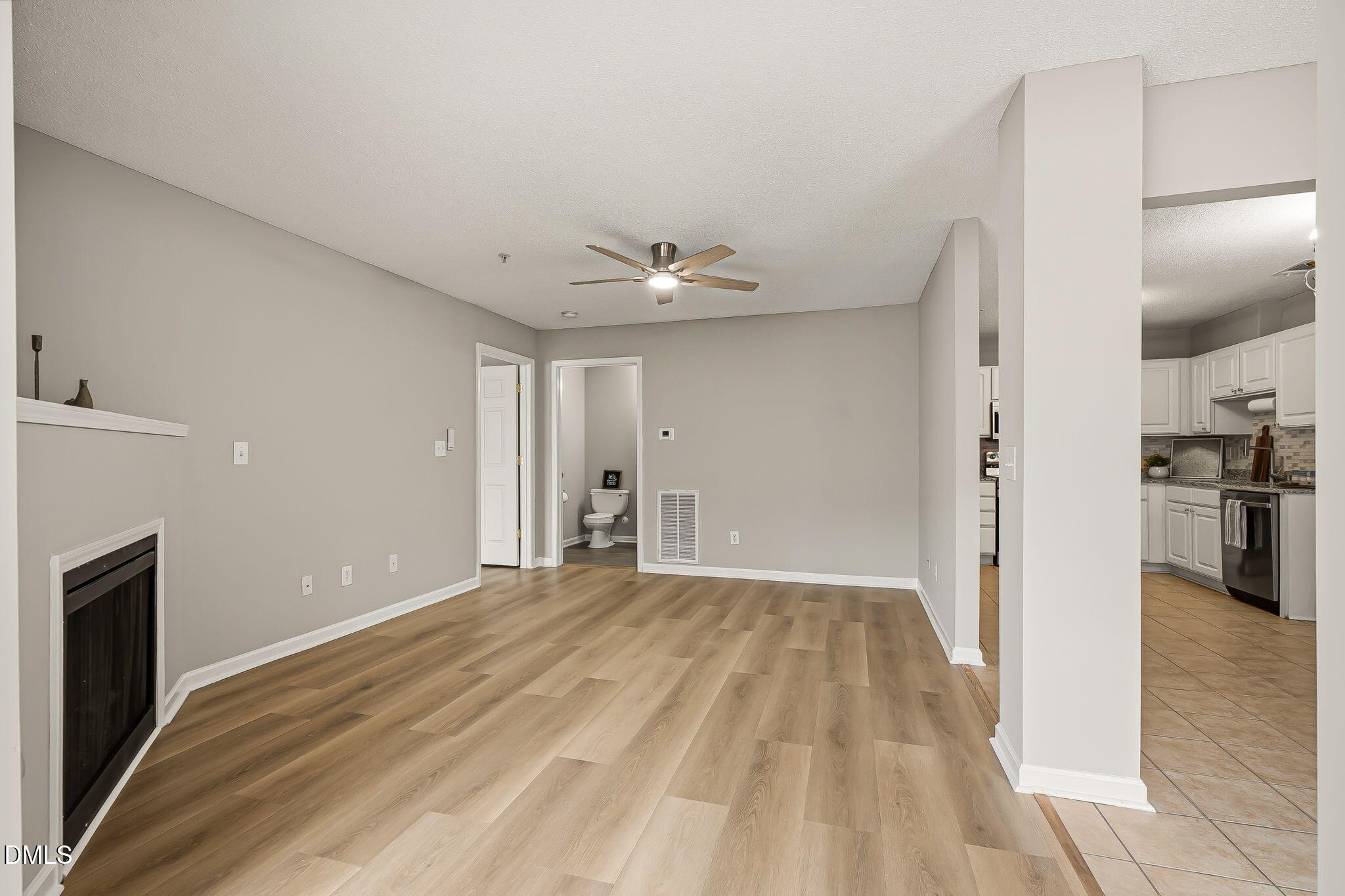 2501 Huntscroft Lane, Unit 100 Raleigh, NC 27617 - Photo 15 of 31 a view of a livingroom with a fireplace
