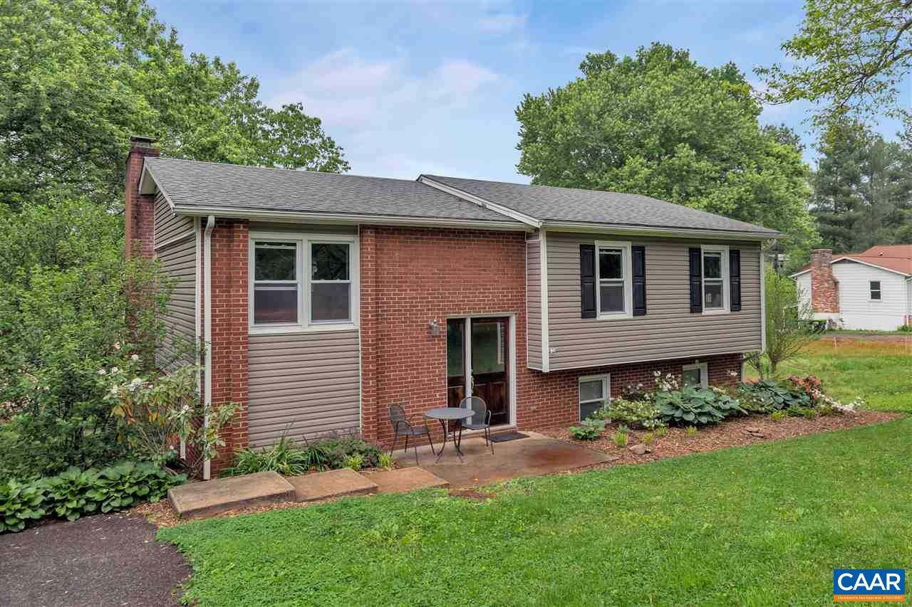 960 Claudius Court Crozet, VA 22932 - Photo 1 of 22 a front view of a house with a garden