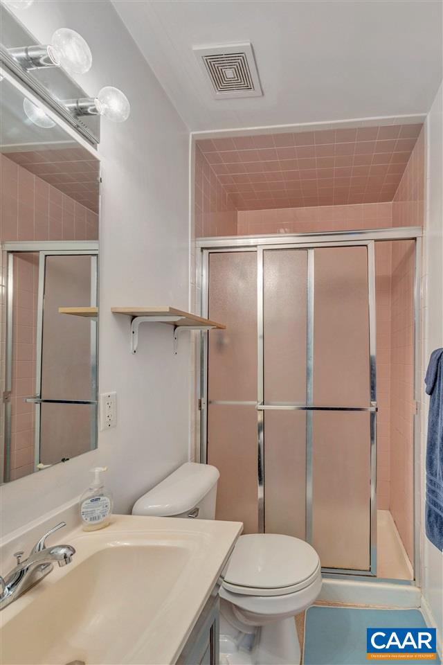 960 Claudius Court Crozet, VA 22932 - Photo 11 of 22 a bathroom with a sink toilet and shower