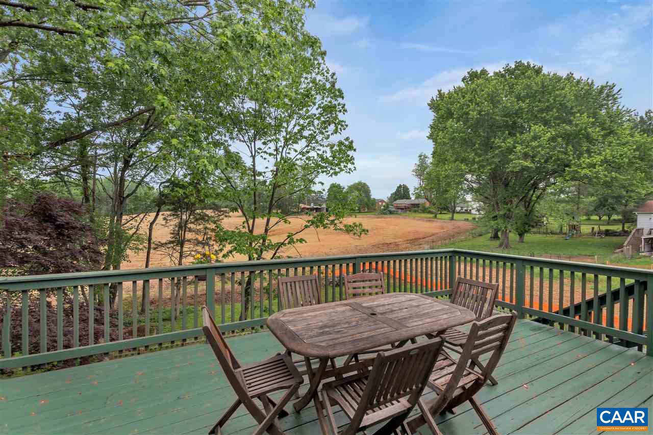 960 Claudius Court Crozet, VA 22932 - Photo 16 of 22 a view of a wooden deck with furniture